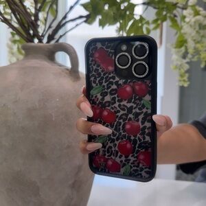iPhone 15 pro max cheetah cherry phone case